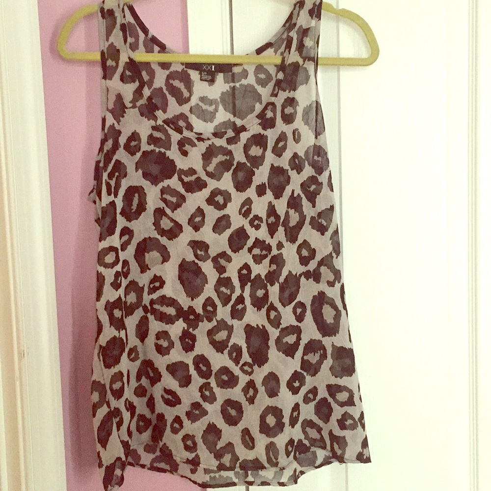 Black and grey chiffon sleeveless blouse.